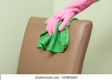 Leather Chair Back Cleaning With Cloth In The Office At The Table. Upholstered Furniture. Regular Clean Up.