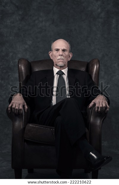 Leather Chair Sitting Senior Businessman Gray Stock Photo Edit