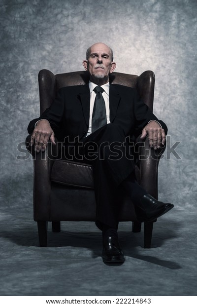 Leather Chair Sitting Senior Businessman Gray Stock Photo Edit