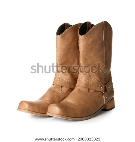 Leather cowboy boots isolated on white background