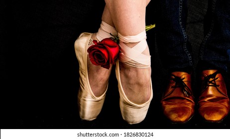 Leather Dressed Cognac Brown Shoes On Dark Blue Jeans And Ballerina Shoes With Red Rose