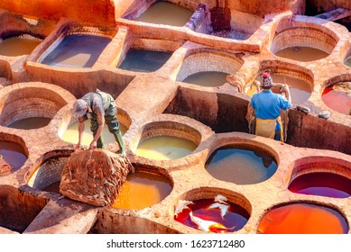 Leather dying in a traditional tannery in the city Fes, Morocco - Powered by Shutterstock