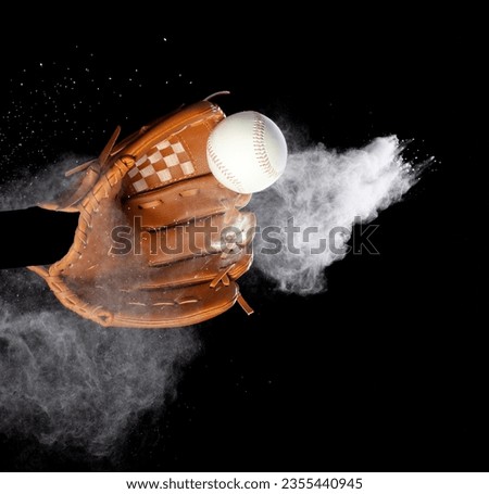 Leather glove mitt receive hit baseball ball and dust soil explode in air. Baseball ball throw and hit to center of mitt glove. Black background isolated freeze action