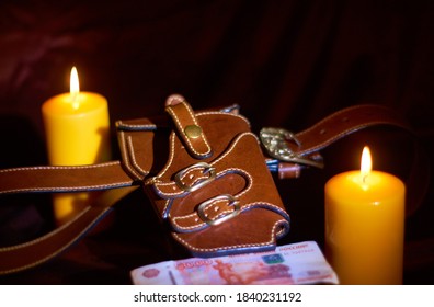                          
leather holster with fittings and candles     