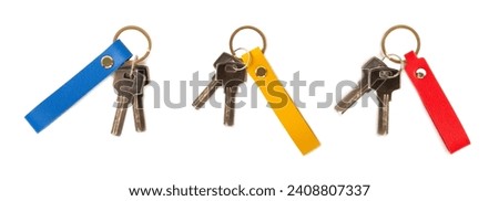 Leather keychain with key ring isolated on white background. Concepts for real estate and moving home or renting property. Buying a property. Mock-up keychain.Copy space.