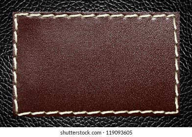 Leather Label on a Black Skin Texture - Shutterstock ID 119093605