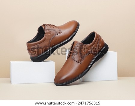 leather lace-up shoes minimalistic creative shot in light background