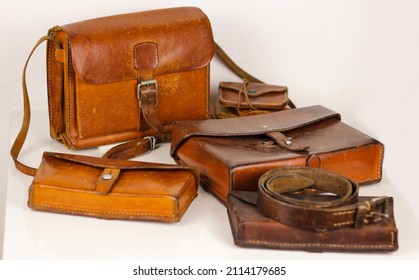 leather manufacture vintage hand made work workshop bags leather bag old retro antique accessory 70s 60s objects background ornament natural leather aged set ammo pouch swiss 