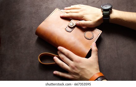 Leather  men`s wallet - Shutterstock ID 667353595
