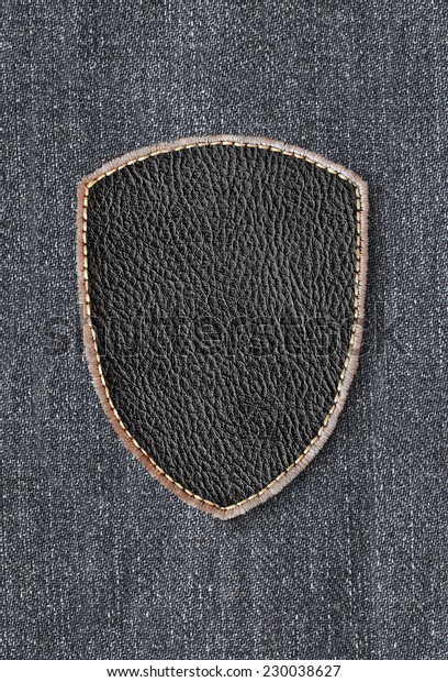 Leather patch on\
denim