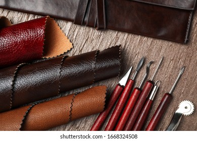 Leather samples and tools on brown table, flat lay - Shutterstock ID 1668324508
