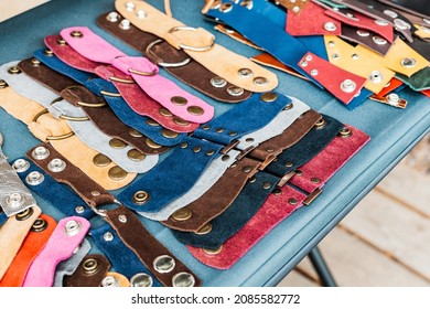 Leather spare parts for repairing bags and clothes with rivets and buttons. Or fancy bracelets and shoulder straps - Powered by Shutterstock