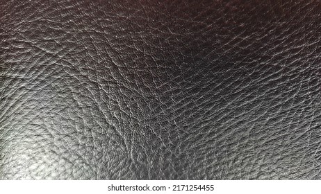 Leather Vinyl Fabric. Black Background With Copy Space