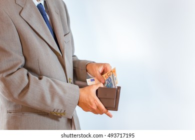 Leather Wallet With Money In Buisness Man Hands On White Background