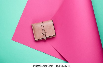 Leather Wallet On Wrapped Paper Background. Color Trend, Minimalistic Fashion Still Life. Top View