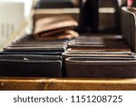 A lot of leather wallets
