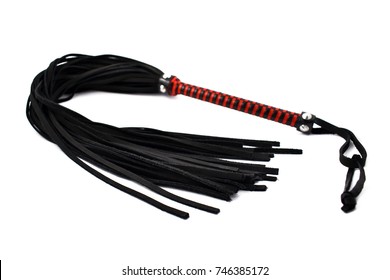 Leather whip stock images. Black leather whip on a white background. BDSM tool