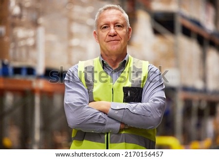 Leave it to the logistical specialist. Portrait of a mature man working in a warehouse.