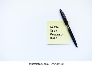 LEAVE YOUR COMMENT HERE Word Concept On Sticky Note And A Pen Over Top View Flat Lay Isolated On White Background.