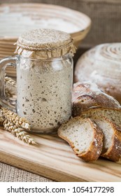 The leaven for bread is active. Startersourdough. The concept of a healthy diet - Shutterstock ID 1054177298