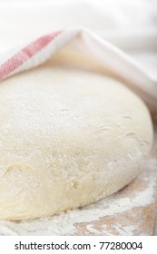 Leavened Dough Rising On The Chopping Board