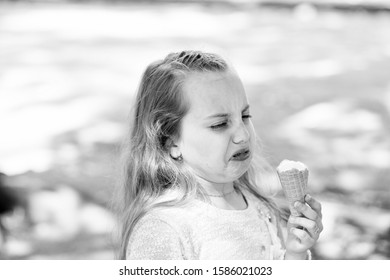 It Leaves A Bad Taste In The Mouth. Cute Little Girl Dislike Taste Of Ice Cream. Small Child Licking Ice Cream With Unpleasant Taste Impression. Her Ice-cream Just Doesnt Taste As Good.