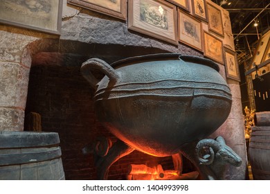 Leavesden, London, UK - May 2019: Warner Bros. Studio Tour ‘The Making Of Harry Potter’ Giant Cauldron And Fireplace