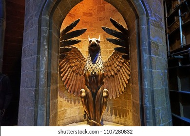 LEAVESDEN,UNITED KINGDOM-DECEMBER 28,2017: The phoenix statue stairs at the entrance gate to Dumbledore Hogwarts Headmaster's office at the warner bros studio tour London - The making of Harry Potter