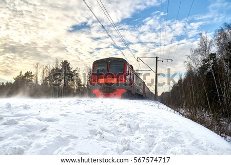 Leaving train on snow-covered railway in the winter forest