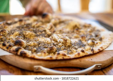 Lebanese Pie Or Manakish On A Wooden Plate