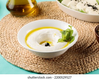 Lebneh or Lebnah served in a dish isolated on wooden table side view of middle eastern food - Powered by Shutterstock