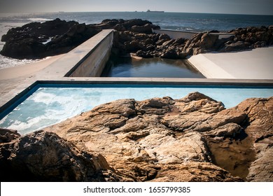 Leca da Palmeira, Portugal - November 2, 2010: Famous swimming pool designed in the open ocean by Alvaro Siza Vieira