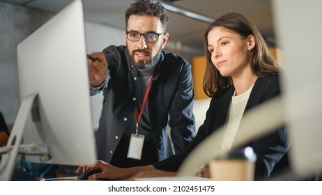 Lecturer Helps Scholar with Project, Advising on Their Work. Teacher Giving Lesson to Diverse Multiethnic Group of Female and Male Students in College Room, Teaching New Academic Skills on a Computer. - Shutterstock ID 2102451475