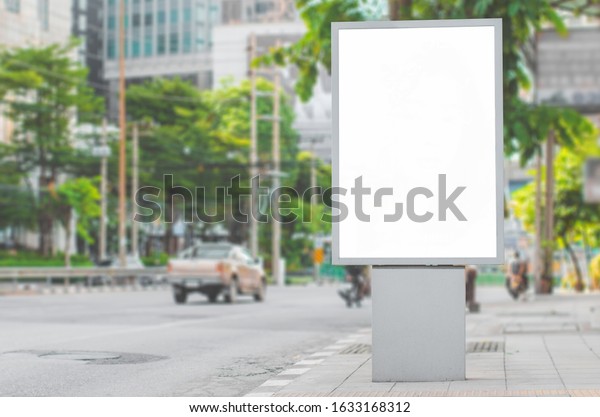 led blank billboard white screen side road in\
city. ad mockup copy space for advertising banner near bus stop in\
metropolis.