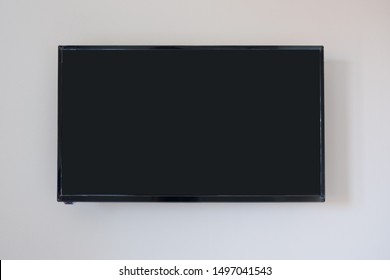 Led Blank Screen Tv On Concrete Wall In Living Room