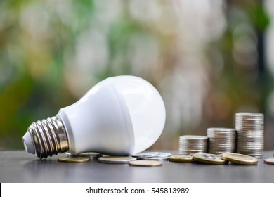 LED Bulb and Coin stack - Saving concept