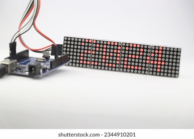 LED dot matrix display project with 2024 being displayed made at home using micro controller and jumper wires