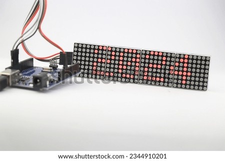 LED dot matrix display project with 2024 being displayed made at home using micro controller and jumper wires