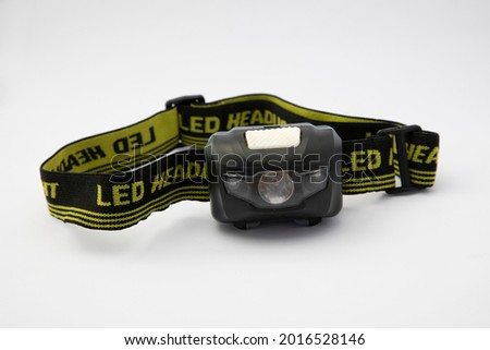 LED headlights with isolated white background can be used for hiking, camping or other outdoor activities.