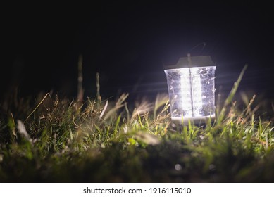 Led Lamp On The Ground At Night Close Up.