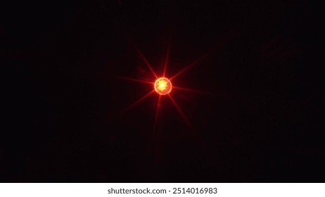 LED Light Blinking Red Diode in Macro Isolated on Black Background