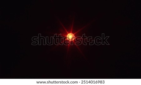 LED Light Blinking Red Diode in Macro Isolated on Black Background