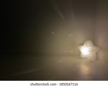 LED light in star shape at the corner.