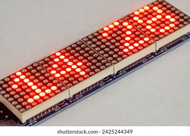 LED matrix 8x8. Composition of LED matrixes on isolated white background. Clock on LED matrix 8x8