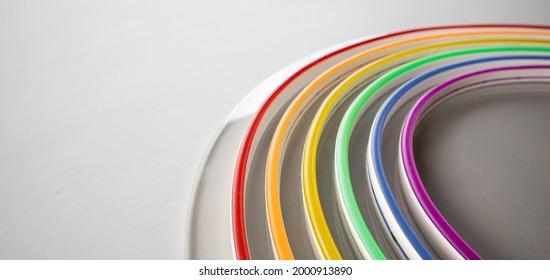 Led Neon Rainbow Laying On The White Table