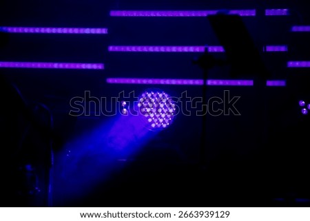 LED stage lights illuminating an empty performance space - just before the musicians arrive onstage.