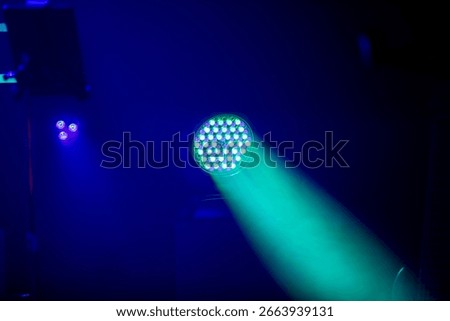 LED stage lights illuminating an empty performance space - just before the musicians arrive onstage.