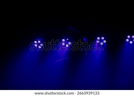 LED stage lights illuminating an empty performance space - just before the musicians arrive onstage.