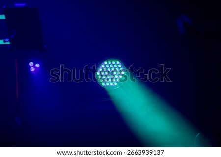 LED stage lights illuminating an empty performance space - just before the musicians arrive onstage.