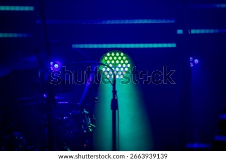LED stage lights illuminating an empty performance space - just before the musicians arrive onstage.